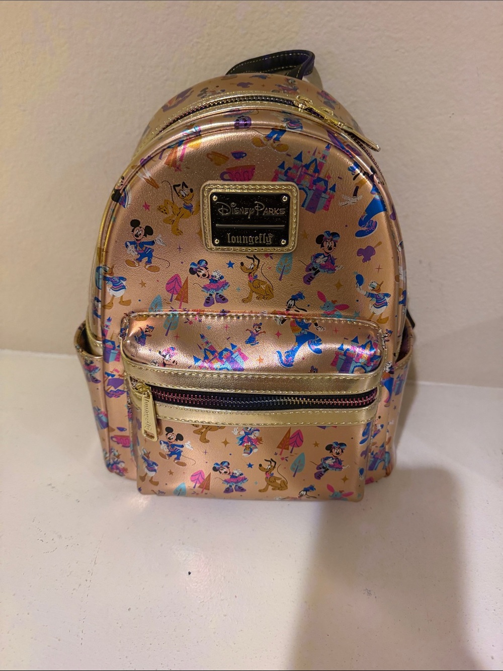 Loungefly Rose Gold Disney Parks Mini Backpack with Character Print